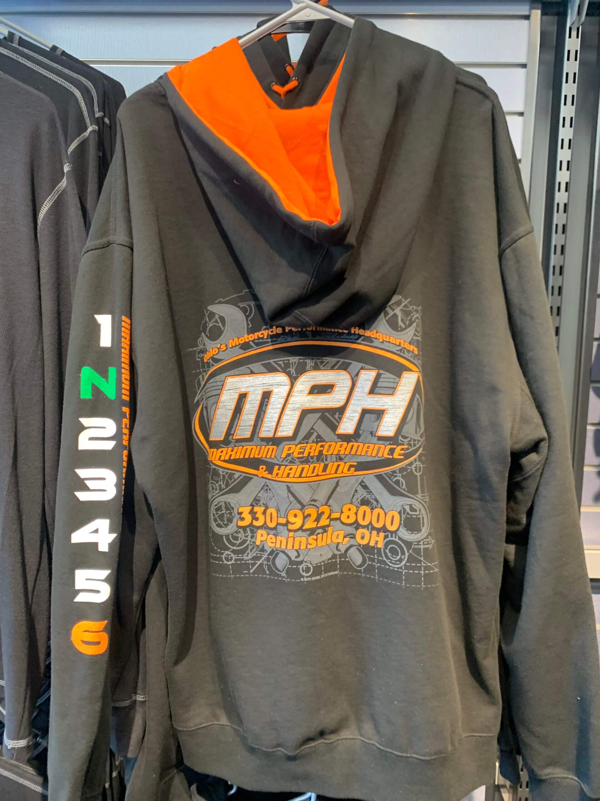 Grey and orange colored MPH T-shirt